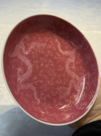 Four Chinese sgraffito ruby-ground 'Dragon' cups and three plates, Qianlong mark, Republic