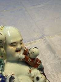 Three Chinese famille rose 'Milefo Buddha', 'Magu' and 'Shoulao' groups, 19/20th C.