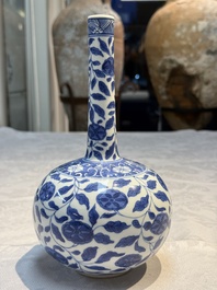 A rare Chinese 'G-marked' blue and white bottle vase with floral design, Kangxi