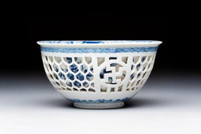 A Chinese blue and white reticulated double-walled 'Swastika' bowl, Kangxi