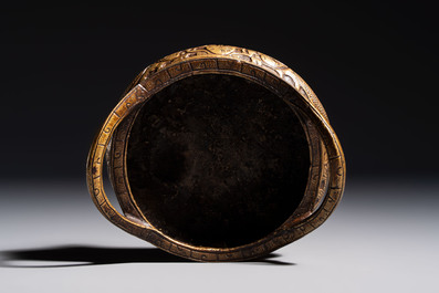 A Chinese bronze tripod 'Dragon' censer with two handles, Xuande mark, 19th C.