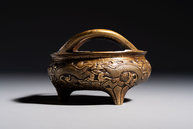 A Chinese bronze tripod 'Dragon' censer with two handles, Xuande mark, 19th C.