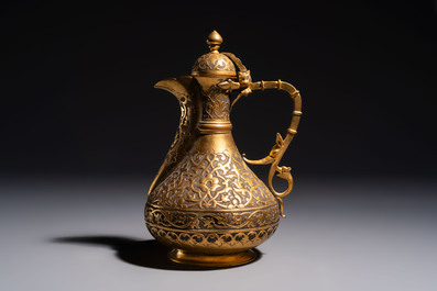 An Ottoman gilt-metal jug with stylised floral design, 19/20th C.