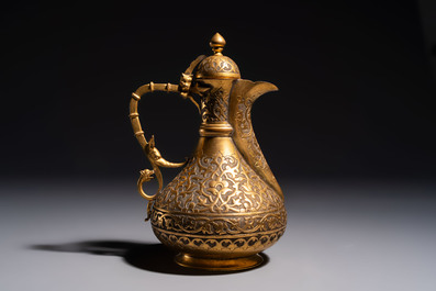 An Ottoman gilt-metal jug with stylised floral design, 19/20th C.