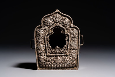 A Tibetan silver and copper Ghau or prayer box, 19th C.