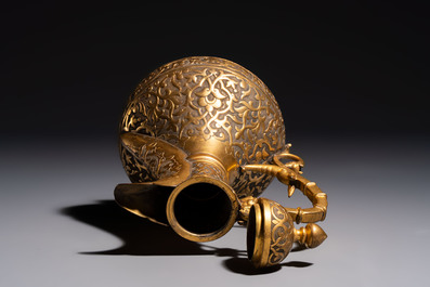 An Ottoman gilt-metal jug with stylised floral design, 19/20th C.