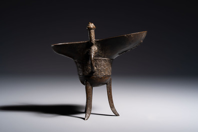 A Chinese archaistic bronze ritual wine vessel, Jue 爵, Qianlong mark, dated 1738