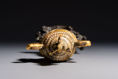 A Chinese parcel-gilt cloisonn&eacute; and bronze 'Conch Shell' Buddhist emblem, 18/19th C.