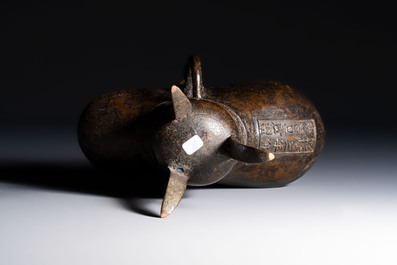 A Chinese archaistic bronze ritual wine vessel, Jue 爵, Qianlong mark, dated 1738