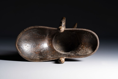 A Chinese archaistic bronze ritual wine vessel, Jue 爵, Qianlong mark, dated 1738