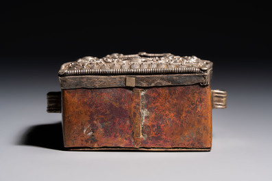 A Tibetan silver and copper Ghau or prayer box, 19th C.