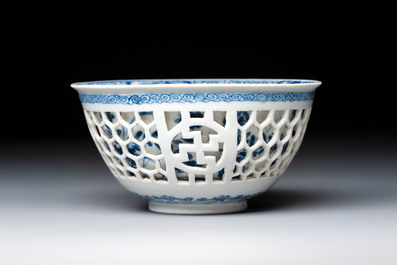 A Chinese blue and white reticulated double-walled 'Swastika' bowl, Kangxi