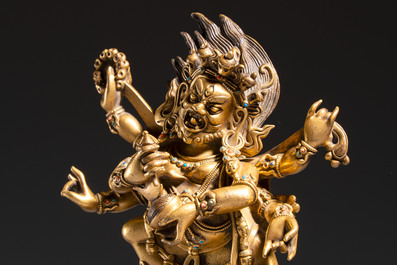 A fine Sino-Tibetan gilt-bronze figure of Mahakala, 18th C.
