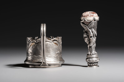 A Russian parcel-gilt silver tea-glass holder or 'podstakannik' and a silver monogram 'herons' seal stamp, 19/20th C.