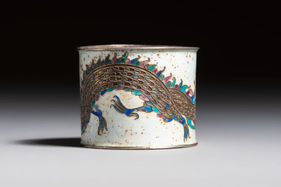 A Chinese enamelled silver 'Dragon' napkin ring, a pair of silver buckles and a pair of cloisonn&eacute; buckles, 19/20th C.
