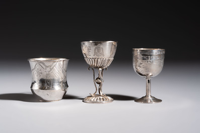 A Chinese silver 'Dragon' vase, two stem cups and a handled cup, various marks, 19/20th C.