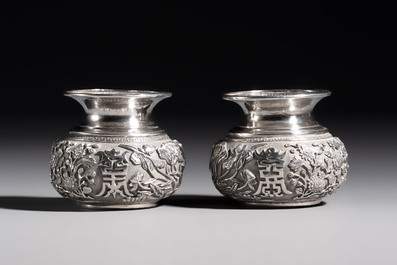 A pair of Chinese silver jarlets, a pair of saucer dishes, a rectangular casket and a cylindrical box, 19/20th C.