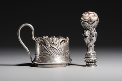 A Russian parcel-gilt silver tea-glass holder or 'podstakannik' and a silver monogram 'herons' seal stamp, 19/20th C.