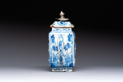 A rare blue and white Dutch Delft relief-moulded teapot and cover, late 17th C.