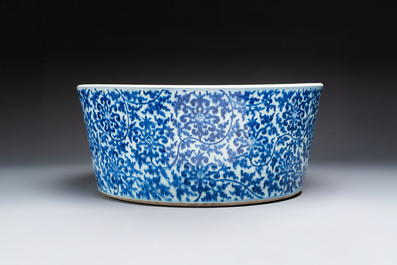 A massive Chinese blue and white 'Buddhist lotus scroll' circular basin, Kangxi