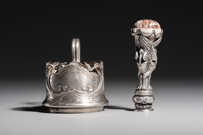 A Russian parcel-gilt silver tea-glass holder or 'podstakannik' and a silver monogram 'herons' seal stamp, 19/20th C.