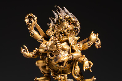 A fine Sino-Tibetan gilt-bronze figure of Mahakala, 18th C.