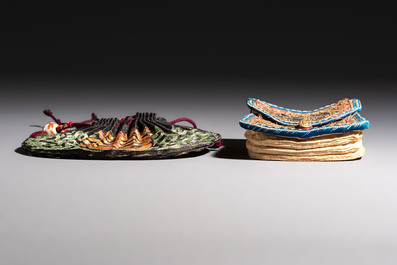 A Chinese embroidered silk pouch and an embroidered textile purse, 19th C.