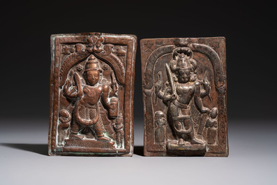 Two Indian bronze figures and two repouss&eacute; copper-alloy plaques, 18/19th C.