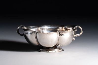An Italian silver lobed footed bowl with handles, mark of the crossed Keys of St. Peter under a liturgical umbrella, Papal States, Rome, 18th C.