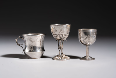 A Chinese silver 'Dragon' vase, two stem cups and a handled cup, various marks, 19/20th C.