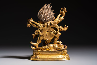 A fine Sino-Tibetan gilt-bronze figure of Mahakala, 18th C.
