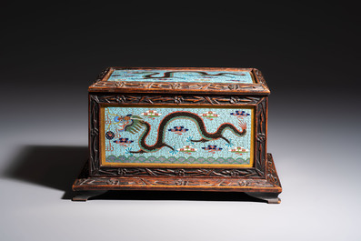 A Chinese wooden 'Dragon' casket mounted with cloisonn&eacute; plaques, 19/20th C.