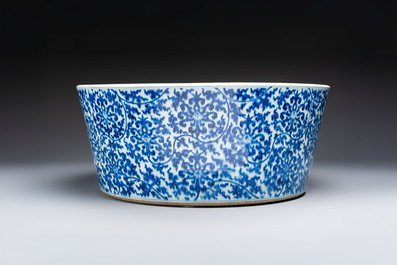 A massive Chinese blue and white 'Buddhist lotus scroll' circular basin, Kangxi