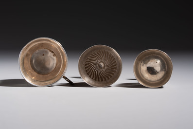 A Chinese silver 'Dragon' vase, two stem cups and a handled cup, various marks, 19/20th C.