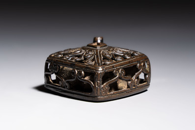 A Chinese openworked double-walled lozenge-shaped bronze water dropper, Ming