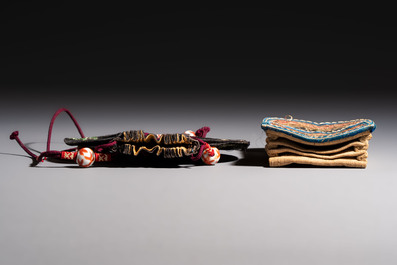 A Chinese embroidered silk pouch and an embroidered textile purse, 19th C.