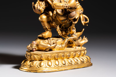 A fine Sino-Tibetan gilt-bronze figure of Mahakala, 18th C.