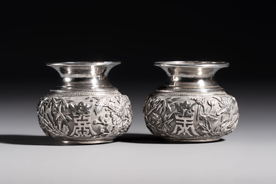 A pair of Chinese silver jarlets, a pair of saucer dishes, a rectangular casket and a cylindrical box, 19/20th C.