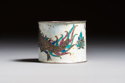 A Chinese enamelled silver 'Dragon' napkin ring, a pair of silver buckles and a pair of cloisonn&eacute; buckles, 19/20th C.