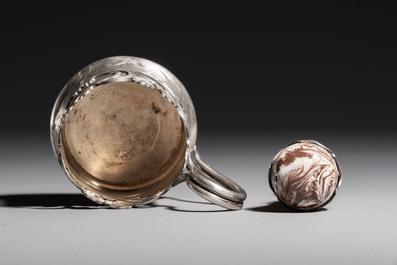A Russian parcel-gilt silver tea-glass holder or 'podstakannik' and a silver monogram 'herons' seal stamp, 19/20th C.