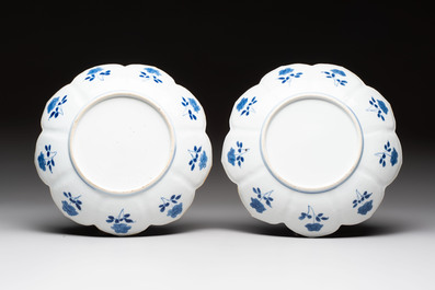 A pair of Chinese blue and white lotus-form 'Grasshopper' plates, Kangxi