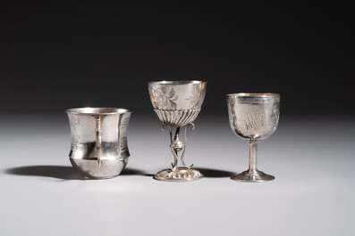 A Chinese silver 'Dragon' vase, two stem cups and a handled cup, various marks, 19/20th C.