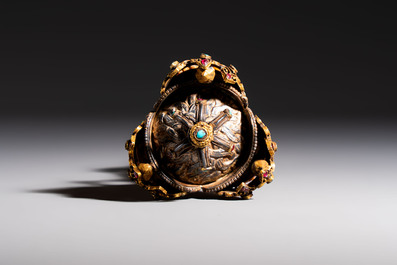 A Tibetan parcel-gilt silver and iron phurba inlaid with precious stones, red coral and bone, 19th C.