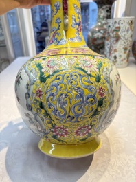 A Chinese famille rose yellow-ground 'Bats and Peaches' bottle vase, Jiaqing/Daoguang