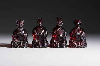 A rare complete set of 12 Chinese cherry amber 'Zodiac' figures on wooden stands, Qianlong mark, Republic