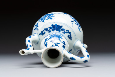 A Chinese blue and white 'Floral' ewer, Transitional period