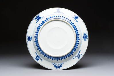 A fine Chinese blue and white 'Elegant Beauties' dish with raised central medallion, Kangxi