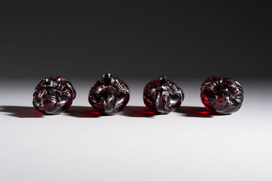 A rare complete set of 12 Chinese cherry amber 'Zodiac' figures on wooden stands, Qianlong mark, Republic