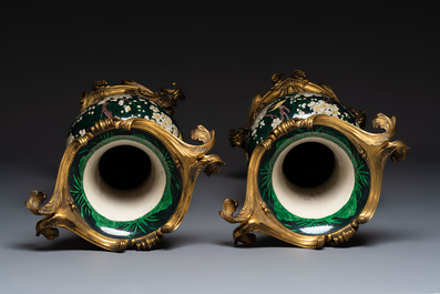 A massive pair of gilt-bronze-mounted famille noire style vases, Samson, Paris, 19th C.