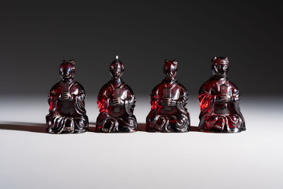 A rare complete set of 12 Chinese cherry amber 'Zodiac' figures on wooden stands, Qianlong mark, Republic